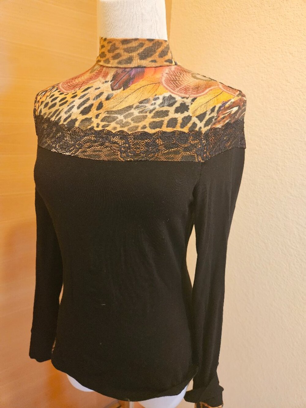Leopard print mock neck top with lace trim black